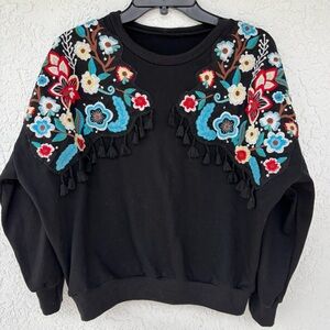 Black embroidered sweatshirt with fringe